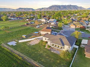 Aerial view at dusk of a residential view and a mountain view