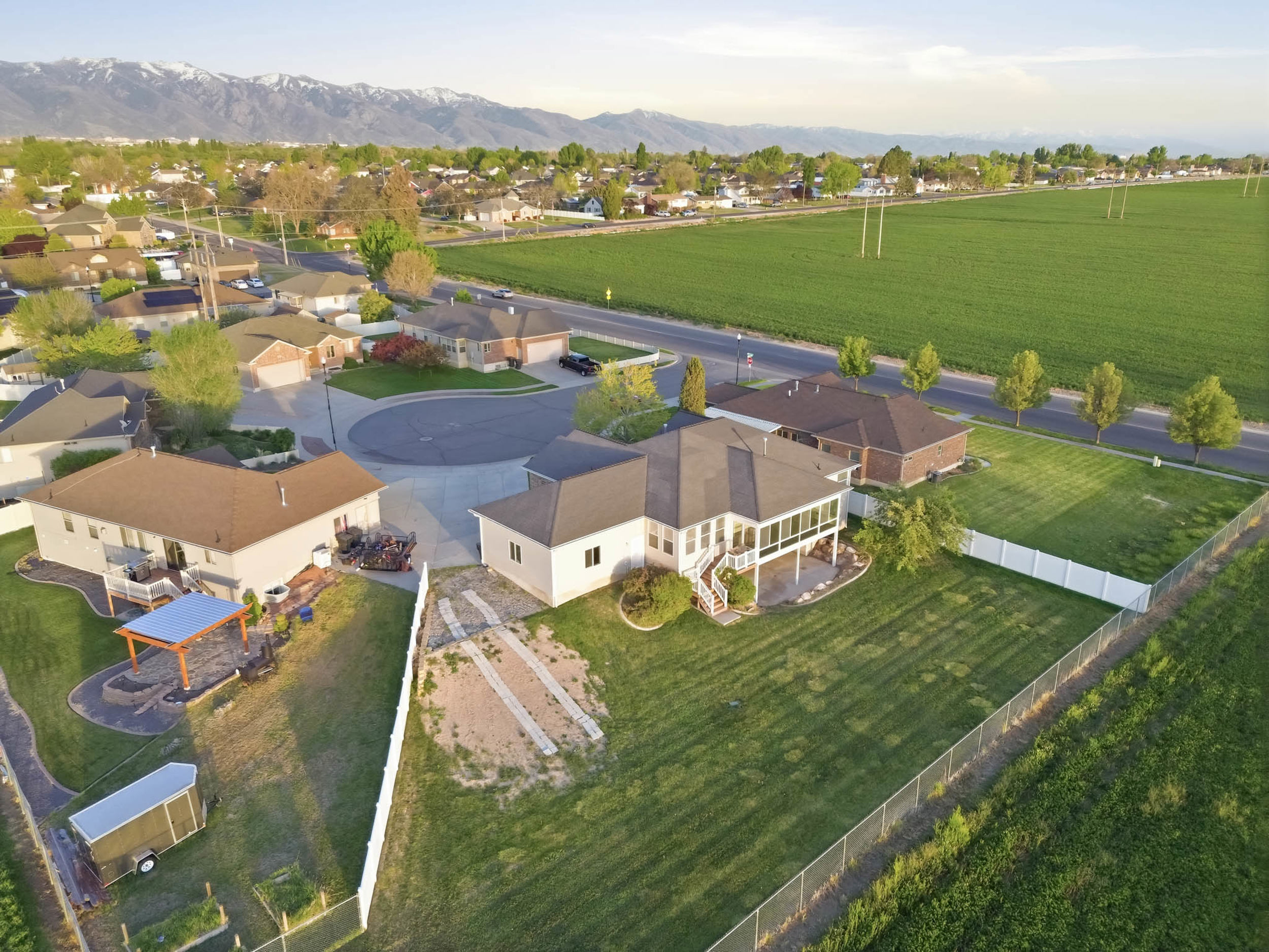 Aerial view of residential area featuring a mountain backdrop