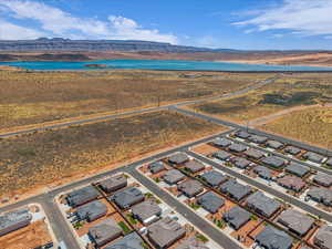 Aerial perspective of suburban area with a mountain backdrop
