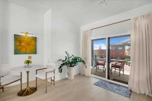 Doorway with wood finished floors