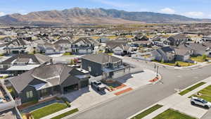 Aerial view of residential area featuring mountains