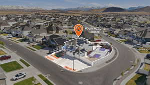 Aerial perspective of suburban area featuring mountains