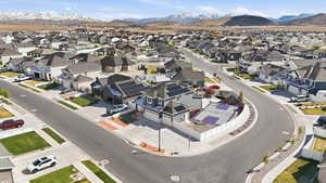 Aerial view of residential area with a mountainous background