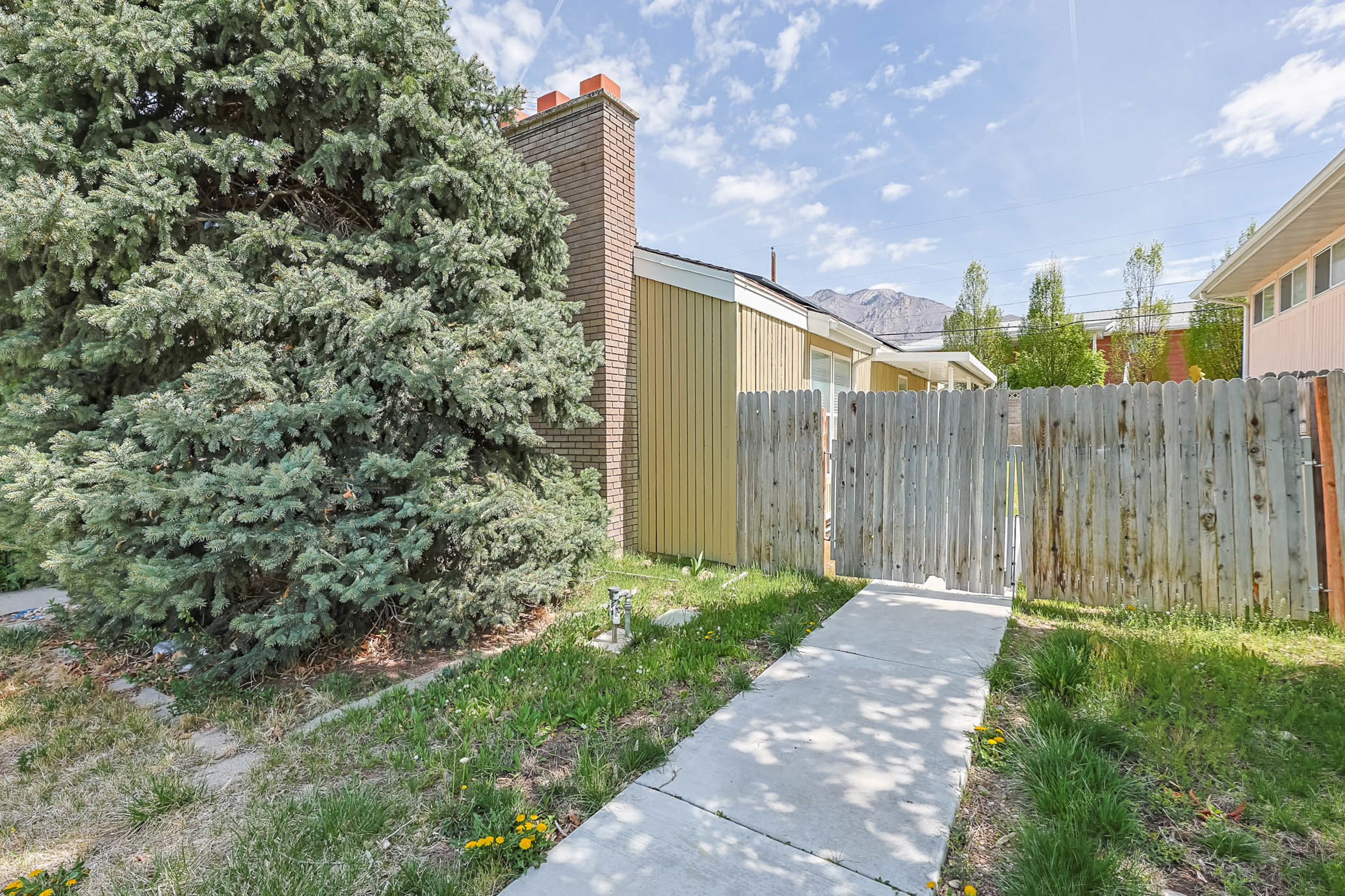View of yard with a gate