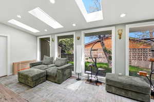 Sunroom / solarium featuring a skylight