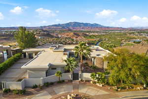 Aerial view of residential area featuring mountains