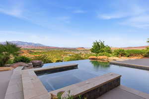 View of swimming pool featuring a mountain view