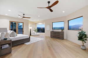 Bedroom featuring light wood-type flooring, access to exterior, ceiling fan, and recessed lighting