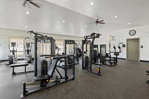 Gym featuring a ceiling fan and recessed lighting