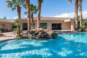 Community pool with a patio area