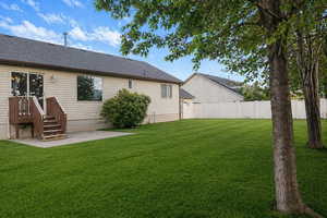 Back of property with a patio area