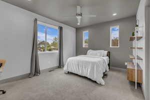 Bedroom with carpet, recessed lighting, and a ceiling fan