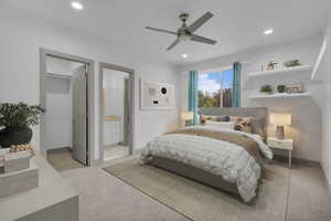 Bedroom featuring light carpet, a spacious closet, recessed lighting, and ceiling fan
