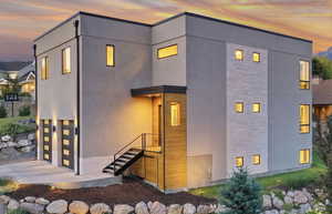 View of front of home with stucco siding