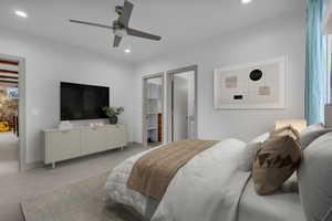 Bedroom featuring a spacious closet, a ceiling fan, carpet, and recessed lighting