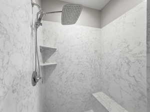 Bathroom view of a marble finish shower