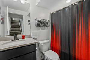 Bathroom featuring vanity and a shower with curtain