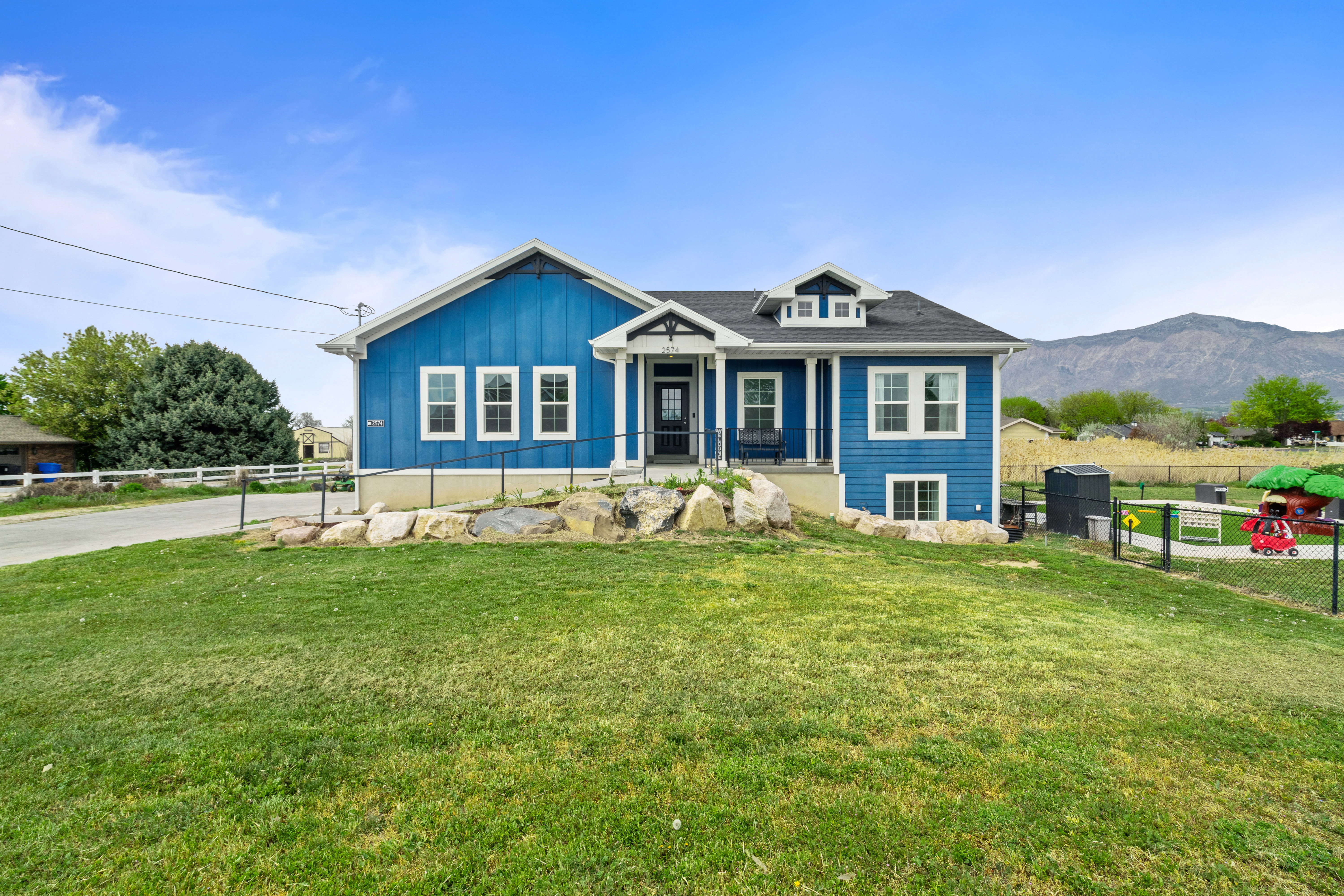Bungalow-style home with covered porch and board and batten siding