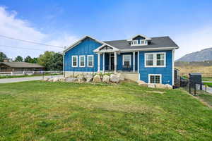 Bungalow-style home with board and batten siding