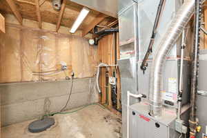 Utility room with heating unit and water heater