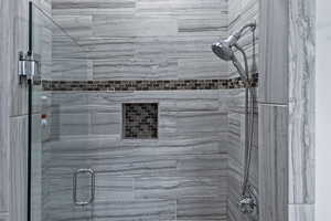 Full bathroom with a stall shower