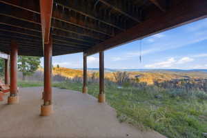 View of patio / terrace with a mountain view