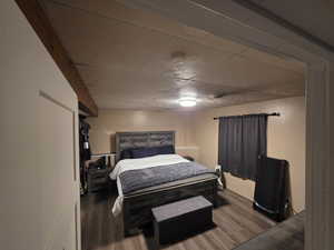 Bedroom with wood finished floors