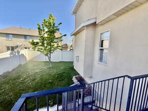 View of fenced backyard