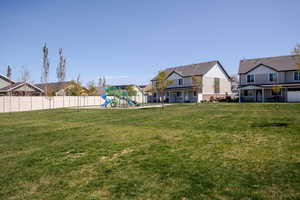 View of yard featuring a residential view and a patio area