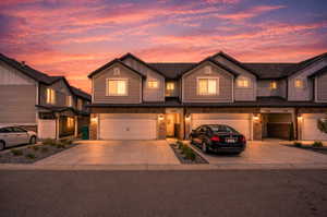 Craftsman inspired home with board and batten siding, concrete driveway, and a garage