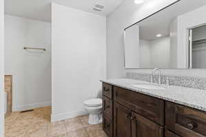 Primary Bathroom Full bath featuring vanity, light tile patterned floors, and recessed lighting