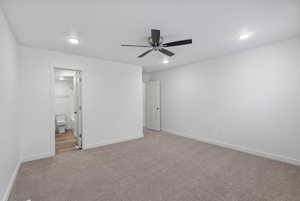 Unfurnished bedroom with a ceiling fan, carpet flooring, recessed lighting, and connected bathroom