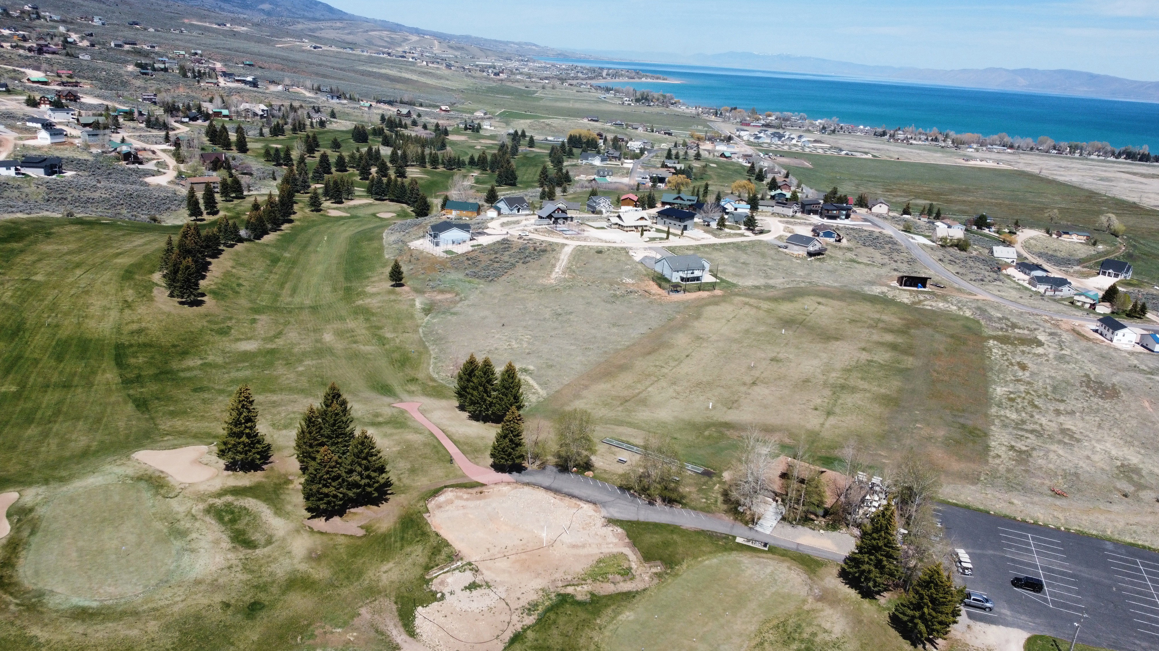 View of property location with a water and mountain view