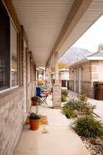 Covered porch with a mountain view