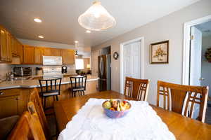 Dining area with recessed lighting