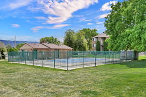 Community pool/clubhouse featuring a mountain view