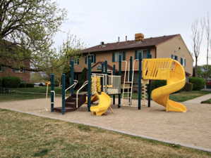 Community play area with a lawn