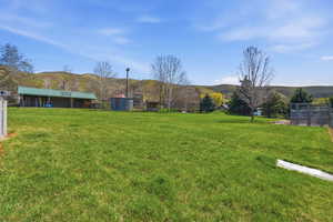 View of pasture featuring a mountain view