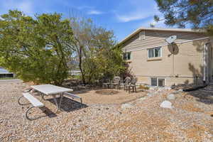 View of side of property featuring a patio