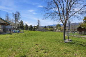 View of yard with a mountain view