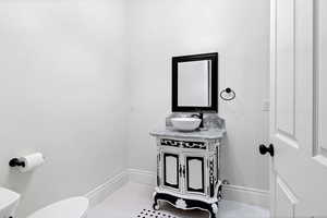 Bathroom featuring vanity and light tile patterned flooring