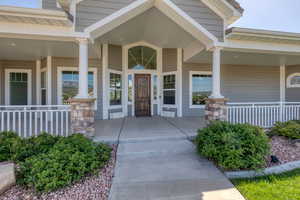 Entrance to property with covered porch