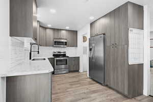 Sleek, functional kitchen with generous cabinet storage, stainless appliances, and a clean, modern feel that keeps everything within easy reach.