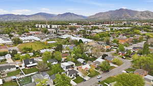 Aerial view of residential area with a mountainous background