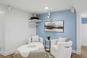 Living area featuring wood finished floors