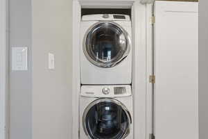 Laundry area with stacked washer / drying machine