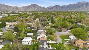 Aerial view of residential area featuring a mountain backdrop