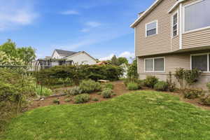 View of fenced backyard