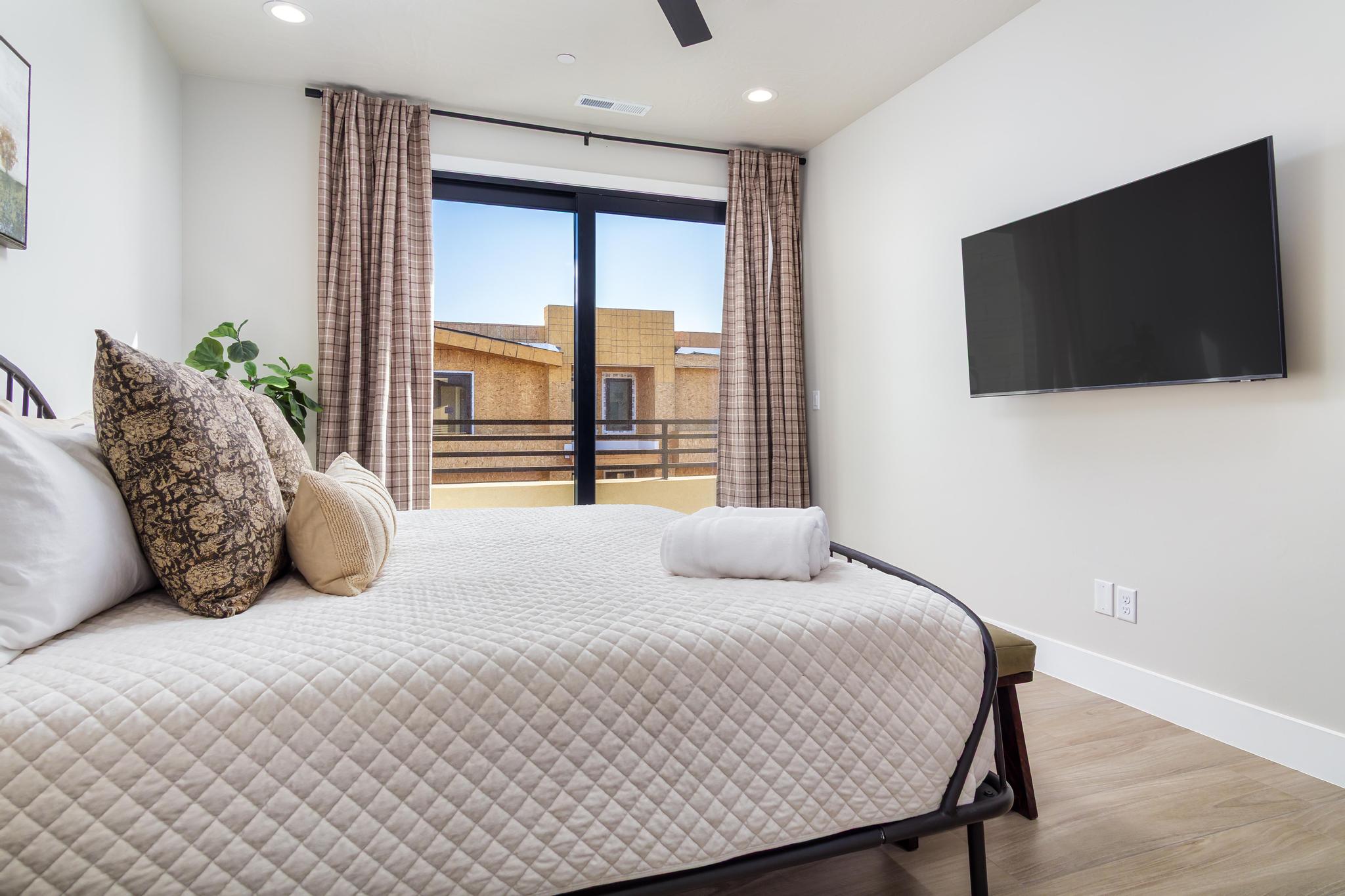 Bedroom with wood finished floors, recessed lighting, and ceiling fan