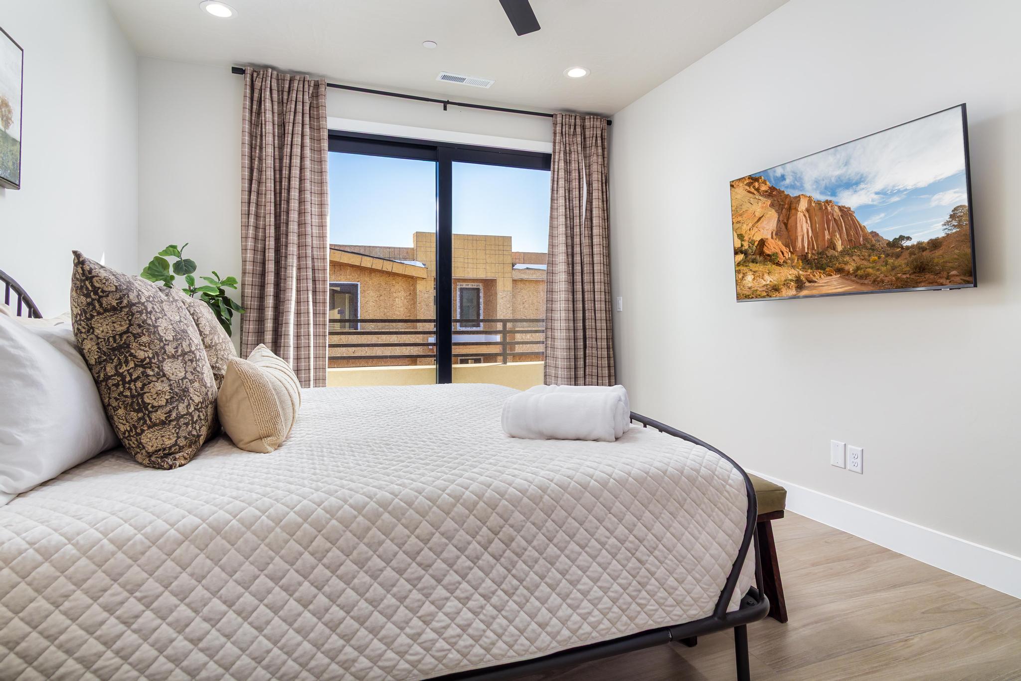 Bedroom featuring wood finished floors, recessed lighting, and a ceiling fan
